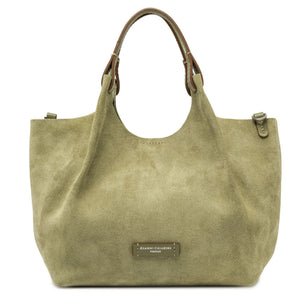 Green handbag with a visible brand label on a white background