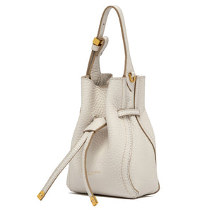 White handbag with gold accents on a white background