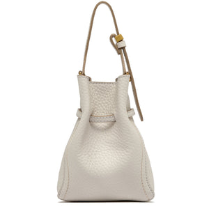 White textured handbag with a brown strap on a white background