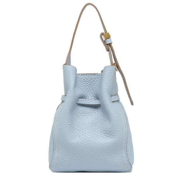 Light blue leather bucket bag with a strap on a white background