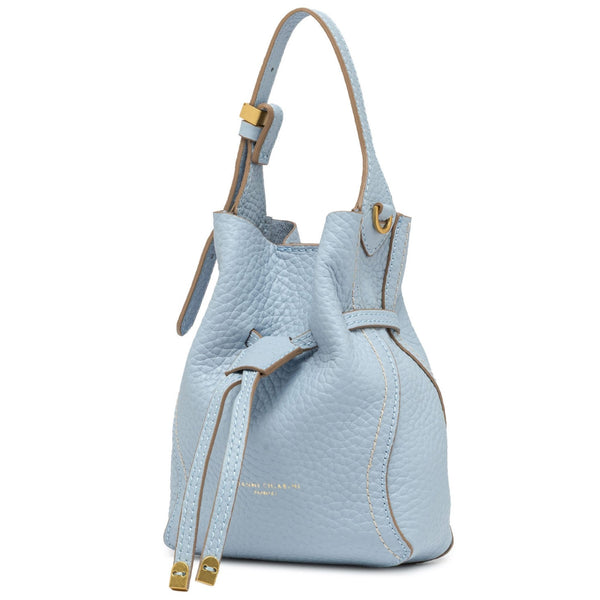 Light blue handbag with gold accents on a white background