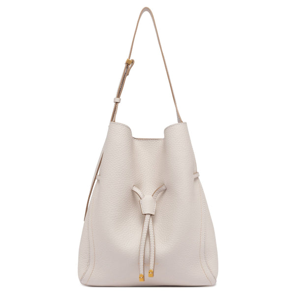 White leather bucket bag with drawstring on a white background