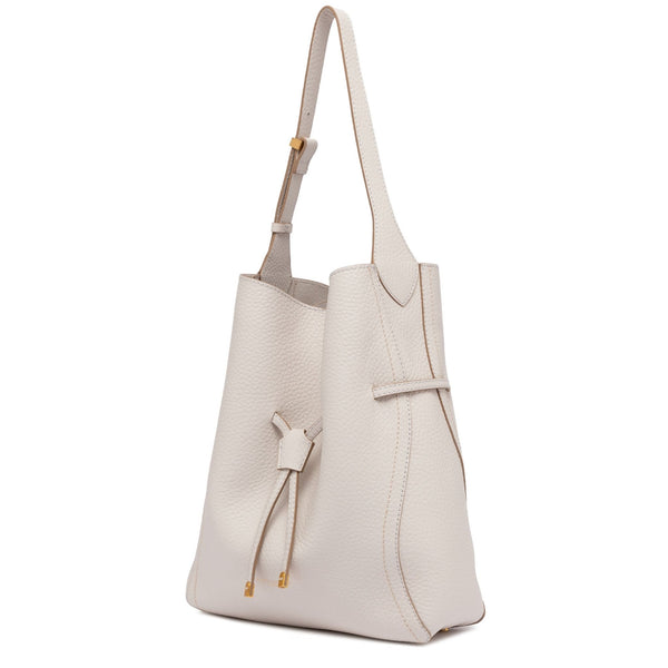 Beige handbag with a strap on a white background