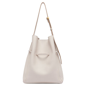 White leather handbag with a strap on a white background