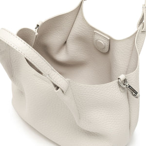 Light gray handbag with textured surface on a white background