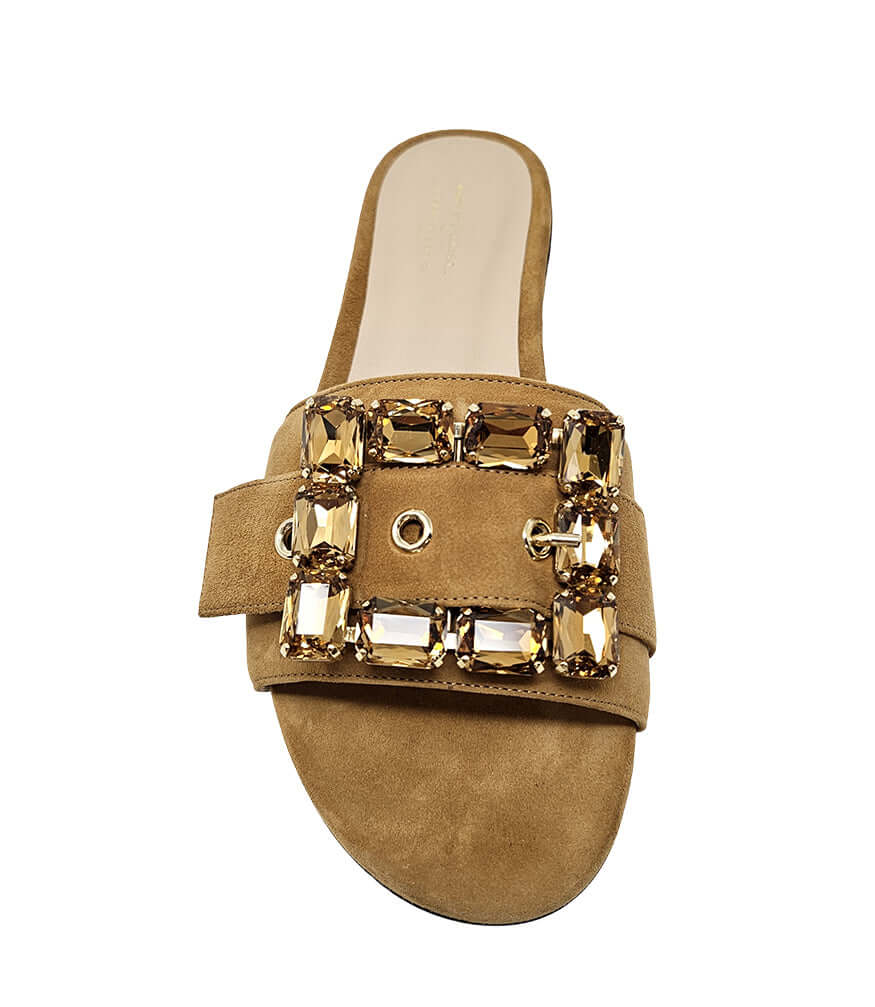 Khaki suede slide sandal with jeweled buckle detail and flat dark sole