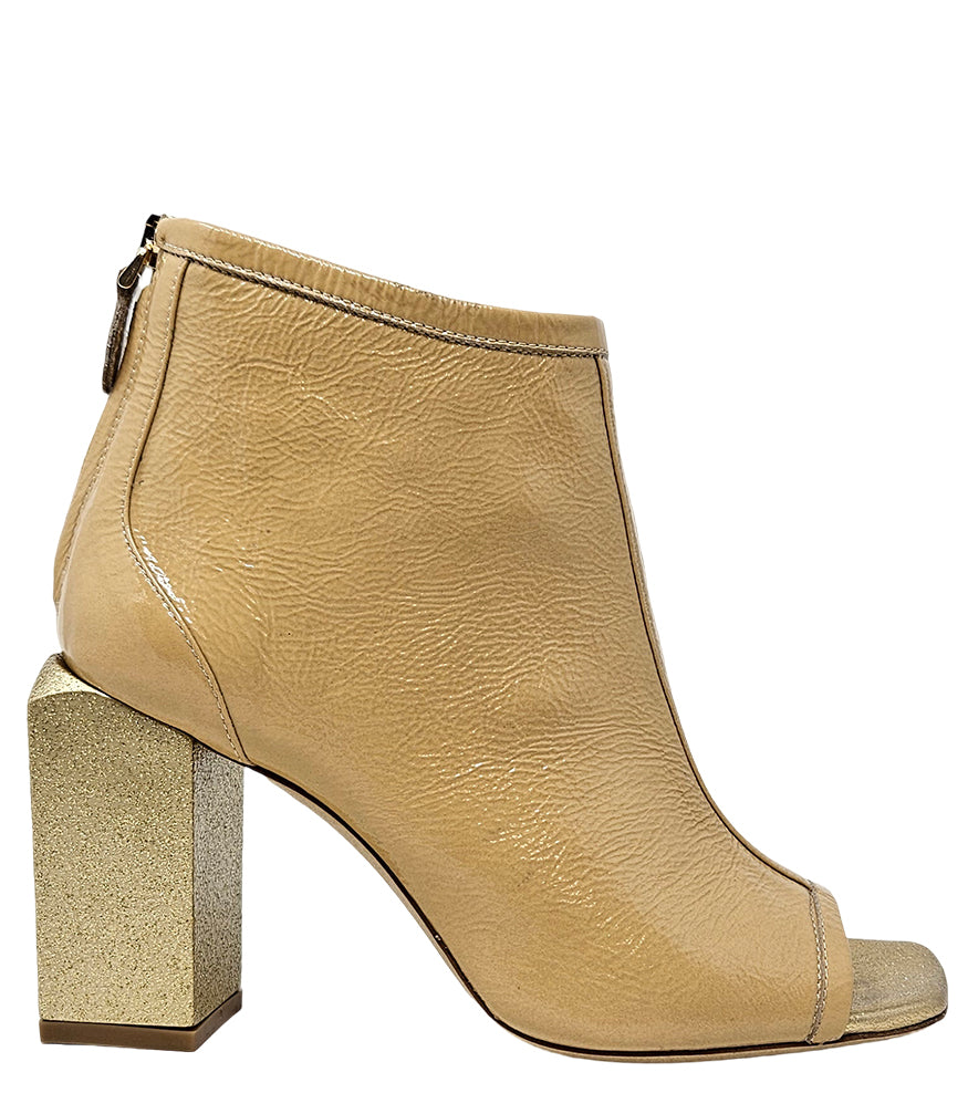"High-heeled open-toe ankle boot handcrafted in Italy from 100% genuine leather, featuring a square toe design and a sturdy block heel for enhanced comfort and style. Ideal for both formal and statement wear.