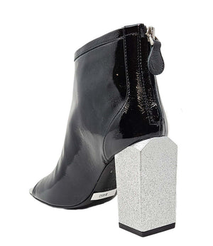 "High-heeled open-toe ankle boot handcrafted in Italy from 100% genuine leather, featuring a square toe design and a sturdy block heel for enhanced comfort and style. Ideal for both formal and statement wear.