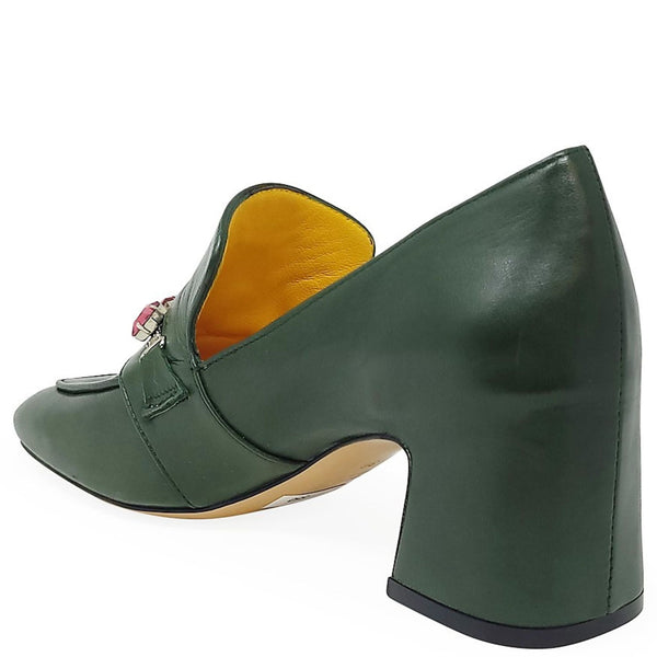 Green high-heeled shoe on a white background