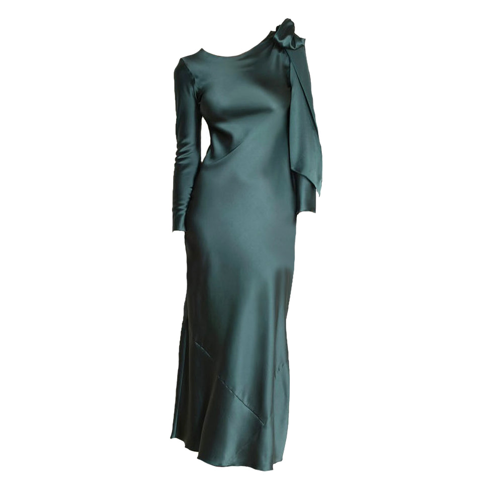 Teal evening gown with a bow detail on a white background