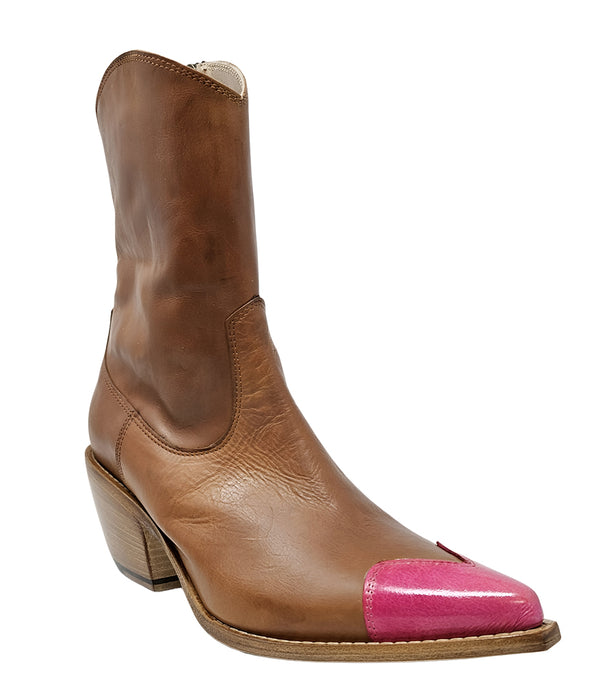 Mid-calf leather boot with block heel, side zipper, and contrasting heart-shaped toe cap. Features a structured silhouette with a pointed toe and minimal seam lines.