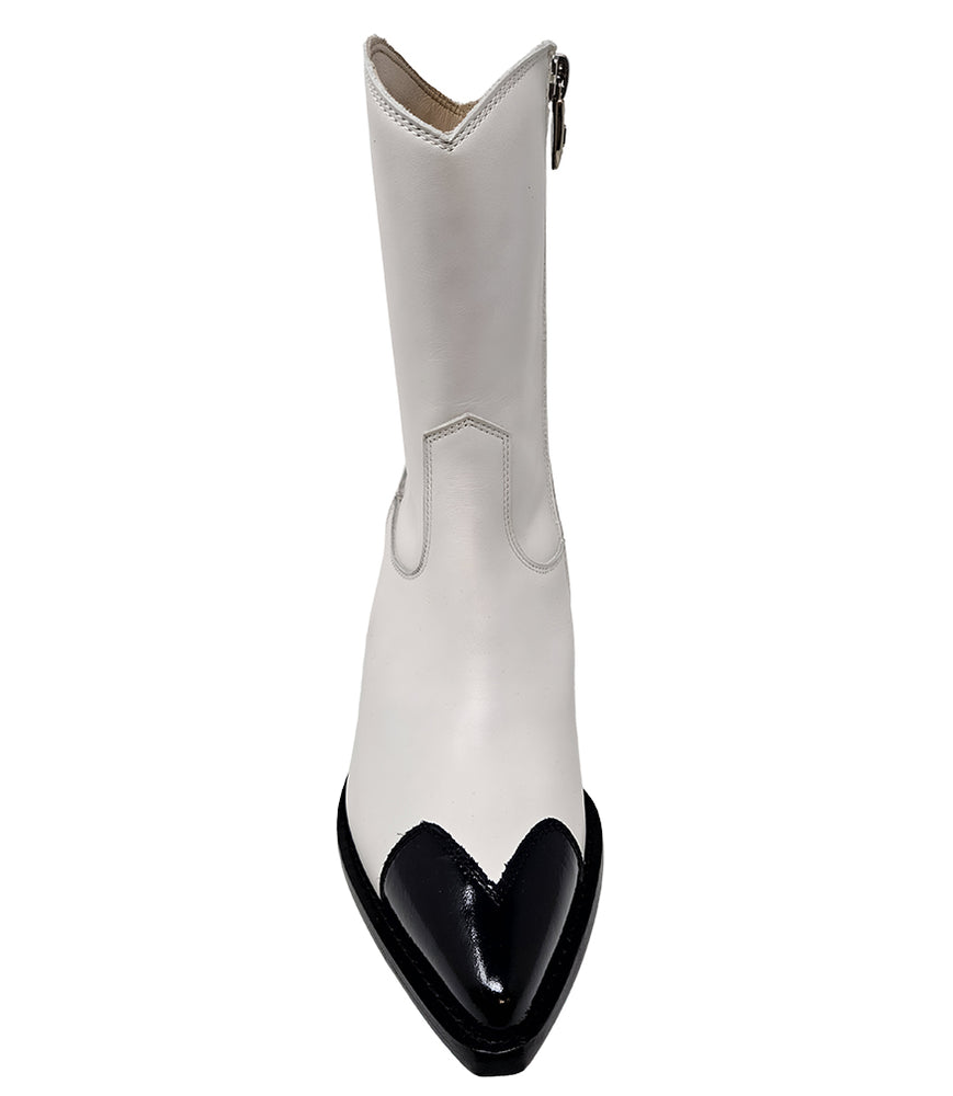 
                      
                        Mid-calf leather boot with block heel, side zipper, and contrasting heart-shaped toe cap. Features a structured silhouette with a pointed toe and minimal seam lines.
                      
                    