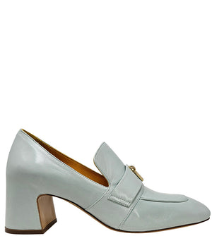 A leather loafer with a block heel, square toe, and a small metal lock detail centered on the upper strap. Designed by Madison in Beverly Hills and handcrafted in Italy.