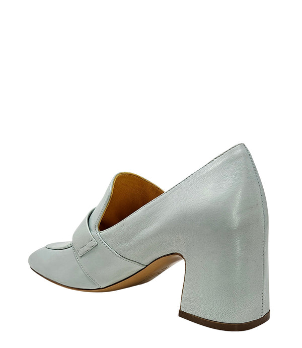 A leather loafer with a block heel, square toe, and a small metal lock detail centered on the upper strap. Designed by Madison in Beverly Hills and handcrafted in Italy.