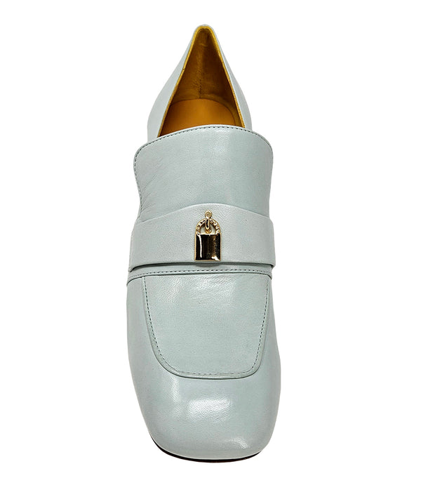 A leather loafer with a block heel, square toe, and a small metal lock detail centered on the upper strap. Designed by Madison in Beverly Hills and handcrafted in Italy.