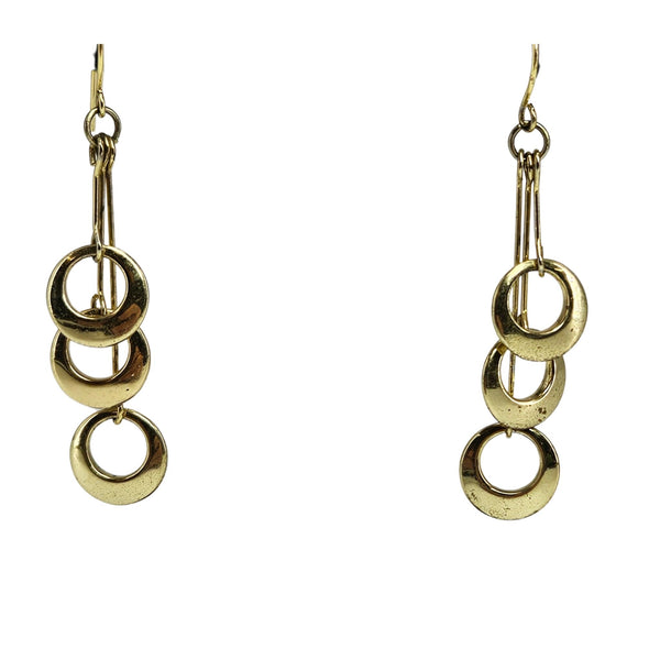 Gold hoop earrings on a white background