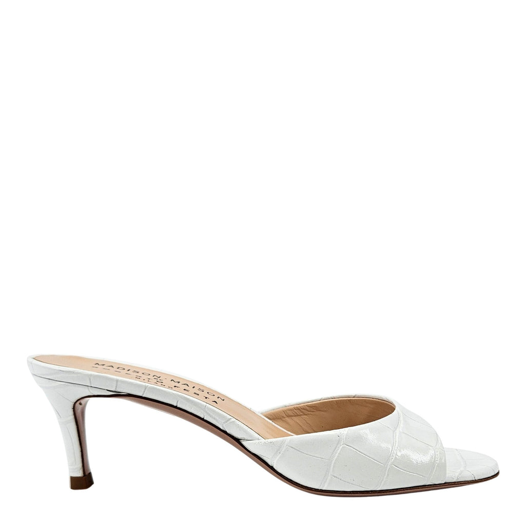 White high-heeled shoe on a white background