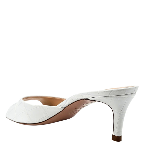 White high-heeled shoe on a white background