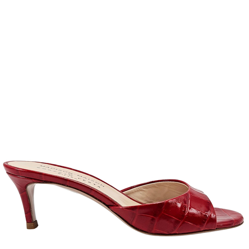 Red high-heeled shoe on a white background