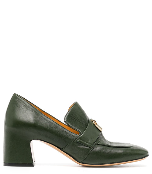 A leather loafer with a block heel, square toe, and a small metal lock detail centered on the upper strap. Designed by Madison in Beverly Hills and handcrafted in Italy.