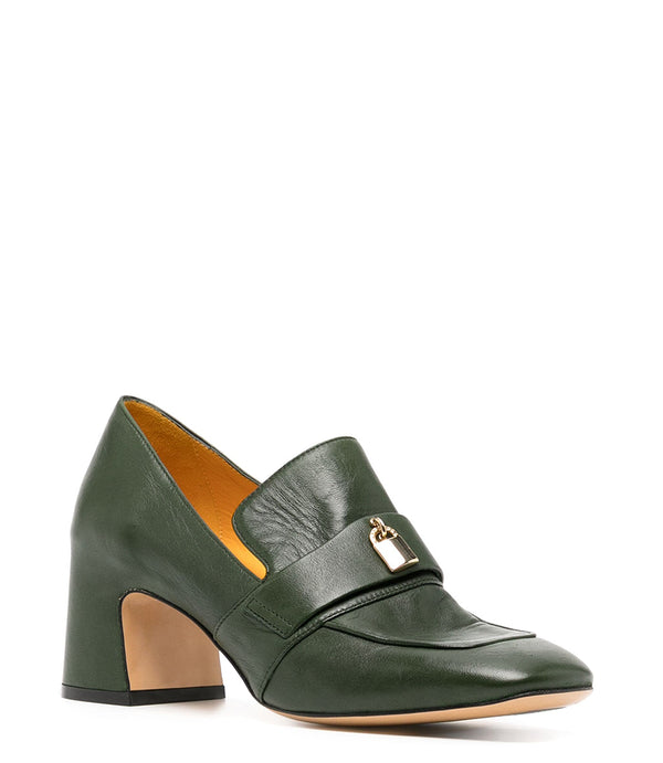 A leather loafer with a block heel, square toe, and a small metal lock detail centered on the upper strap. Designed by Madison in Beverly Hills and handcrafted in Italy.