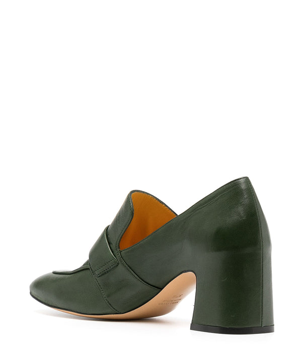 A leather loafer with a block heel, square toe, and a small metal lock detail centered on the upper strap. Designed by Madison in Beverly Hills and handcrafted in Italy.