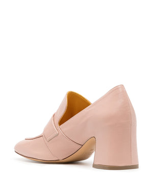 A leather loafer with a block heel, square toe, and a small metal lock detail centered on the upper strap. Designed by Madison in Beverly Hills and handcrafted in Italy.