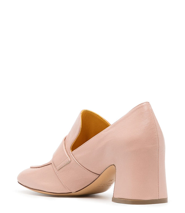 A leather loafer with a block heel, square toe, and a small metal lock detail centered on the upper strap. Designed by Madison in Beverly Hills and handcrafted in Italy.