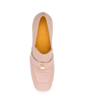 A leather loafer with a block heel, square toe, and a small metal lock detail centered on the upper strap. Designed by Madison in Beverly Hills and handcrafted in Italy.