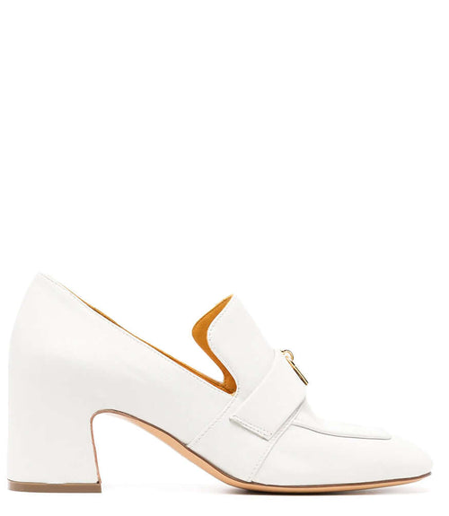A leather loafer with a block heel, square toe, and a small metal lock detail centered on the upper strap. Designed by Madison in Beverly Hills and handcrafted in Italy.