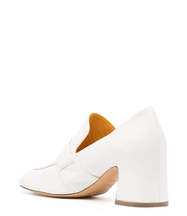 A leather loafer with a block heel, square toe, and a small metal lock detail centered on the upper strap. Designed by Madison in Beverly Hills and handcrafted in Italy.