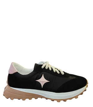 Handcrafted low-top sneaker made in Italy, featuring mixed-material construction with a star-shaped side detail, textured sole, and cushioned laces. Presented from multiple angles against a clean background.
