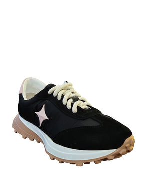 Handcrafted low-top sneaker made in Italy, featuring mixed-material construction with a star-shaped side detail, textured sole, and cushioned laces. Presented from multiple angles against a clean background.