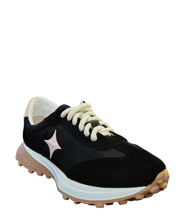 Handcrafted low-top sneaker made in Italy, featuring mixed-material construction with a star-shaped side detail, textured sole, and cushioned laces. Presented from multiple angles against a clean background.