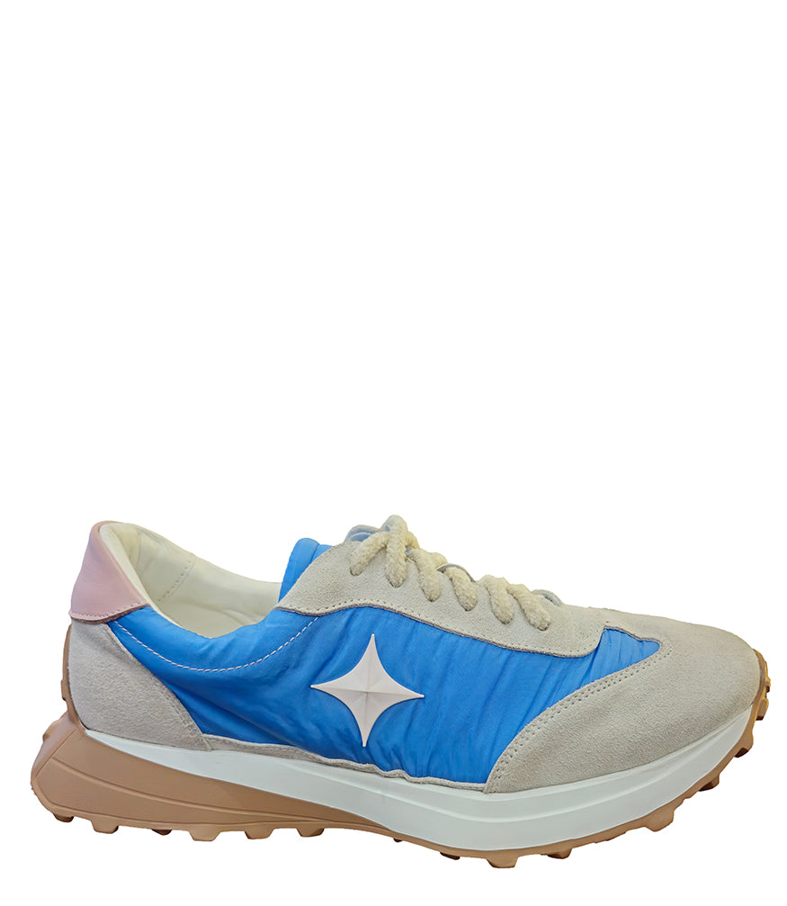 Handcrafted low-top sneaker made in Italy, featuring mixed-material construction with a star-shaped side detail, textured sole, and cushioned laces. Presented from multiple angles against a clean background.