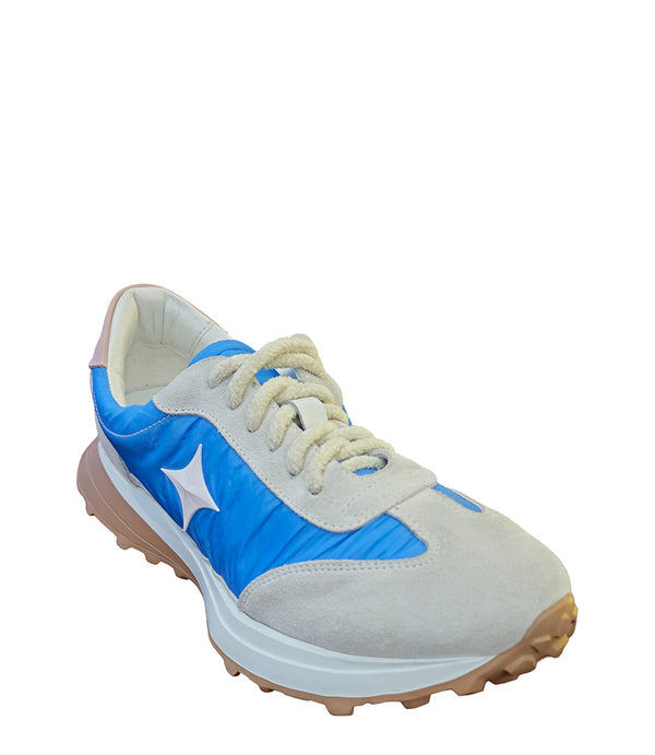 Handcrafted low-top sneaker made in Italy, featuring mixed-material construction with a star-shaped side detail, textured sole, and cushioned laces. Presented from multiple angles against a clean background.
