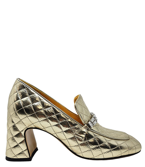 A quilted leather heeled loafer with a square toe and block heel, featuring a decorative band with rectangular gemstone-style embellishments across the upper. Designed by Madison in Beverly Hills and handcrafted in Italy