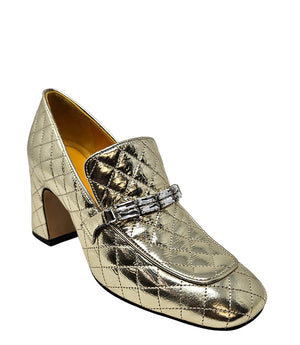 A quilted leather heeled loafer with a square toe and block heel, featuring a decorative band with rectangular gemstone-style embellishments across the upper. Designed by Madison in Beverly Hills and handcrafted in Italy