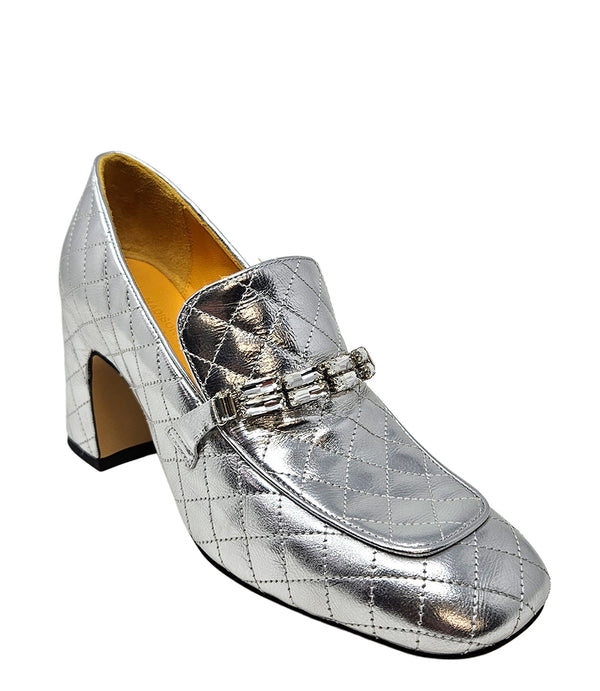 A quilted leather heeled loafer with a square toe and block heel, featuring a decorative band with rectangular gemstone-style embellishments across the upper. Designed by Madison in Beverly Hills and handcrafted in Italy