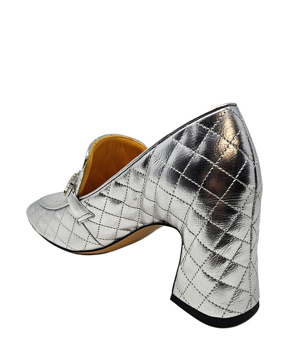 A quilted leather heeled loafer with a square toe and block heel, featuring a decorative band with rectangular gemstone-style embellishments across the upper. Designed by Madison in Beverly Hills and handcrafted in Italy
