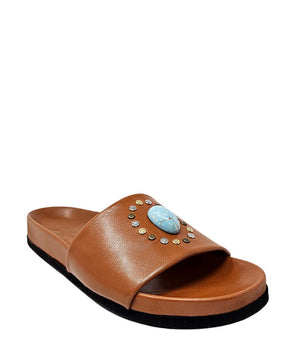 Luxury slip-on sandal handcrafted in Italy with a cushioned footbed and wide strap embellished with decorative elements. Designed by Madison Maison, photographed from multiple angles on a clean white background.