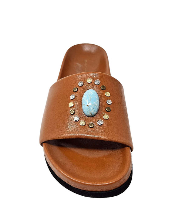 Luxury slip-on sandal handcrafted in Italy with a cushioned footbed and wide strap embellished with decorative elements. Designed by Madison Maison, photographed from multiple angles on a clean white background.