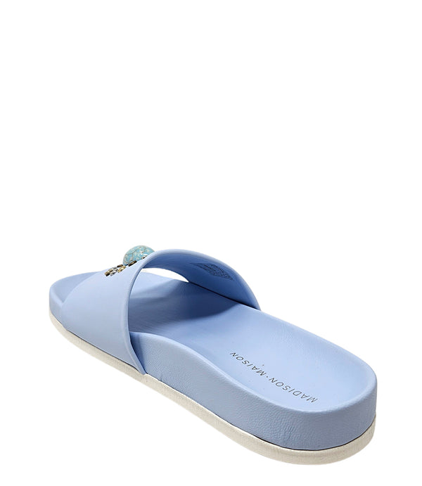 Luxury slip-on sandal handcrafted in Italy with a cushioned footbed and wide strap embellished with decorative elements. Designed by Madison Maison, photographed from multiple angles on a clean white background.