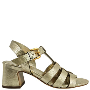Gold metallic sandal with a block heel on a white background