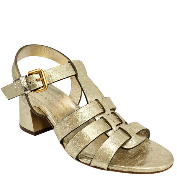 Gold sandal with multiple straps on a white background