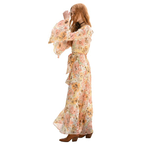 Woman wearing a floral dress on a white background