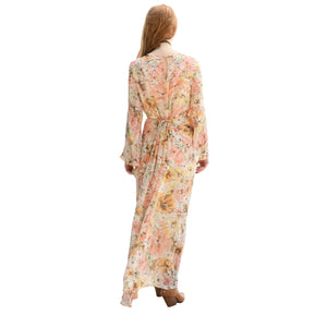 Woman wearing a floral dress on a white background