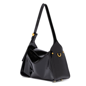Black handbag with gold accents on a white background