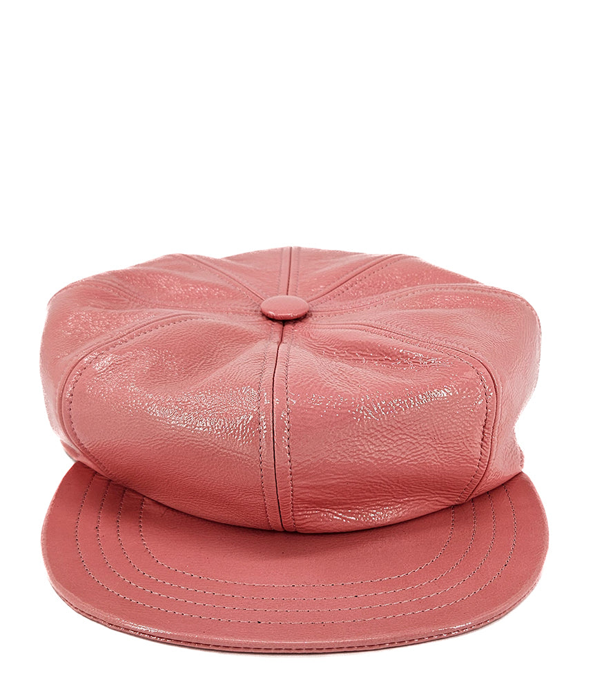 Structured newsboy cap crafted in textured material with panel stitching, a covered button top, and a short curved brim