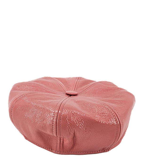 Structured newsboy cap crafted in textured material with panel stitching, a covered button top, and a short curved brim